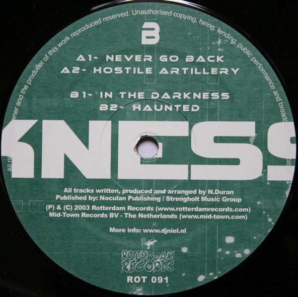 In The Darkness front label