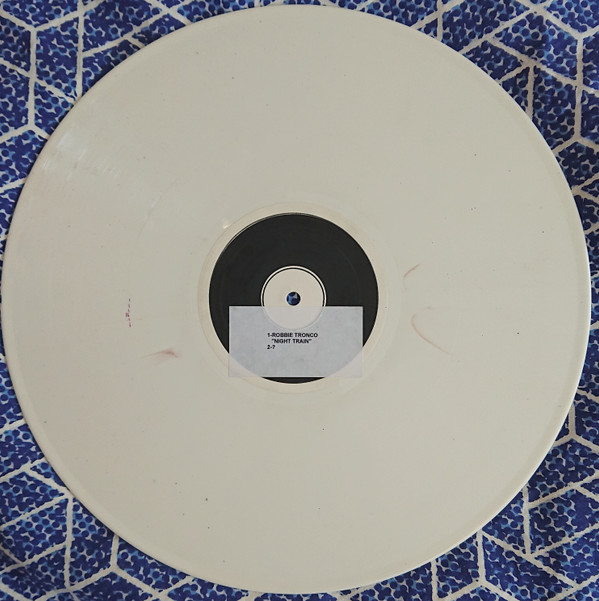 Fright Train / Shake That Ass / 1,2,3 And 4 / Floating Around In XTC / Unknown back label